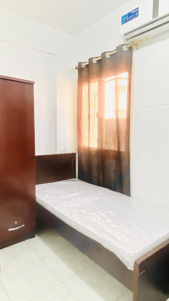 Apartment FURNISHED BEDSPACE AVAILABLE IN ABUSHAGARA, NEXT TO