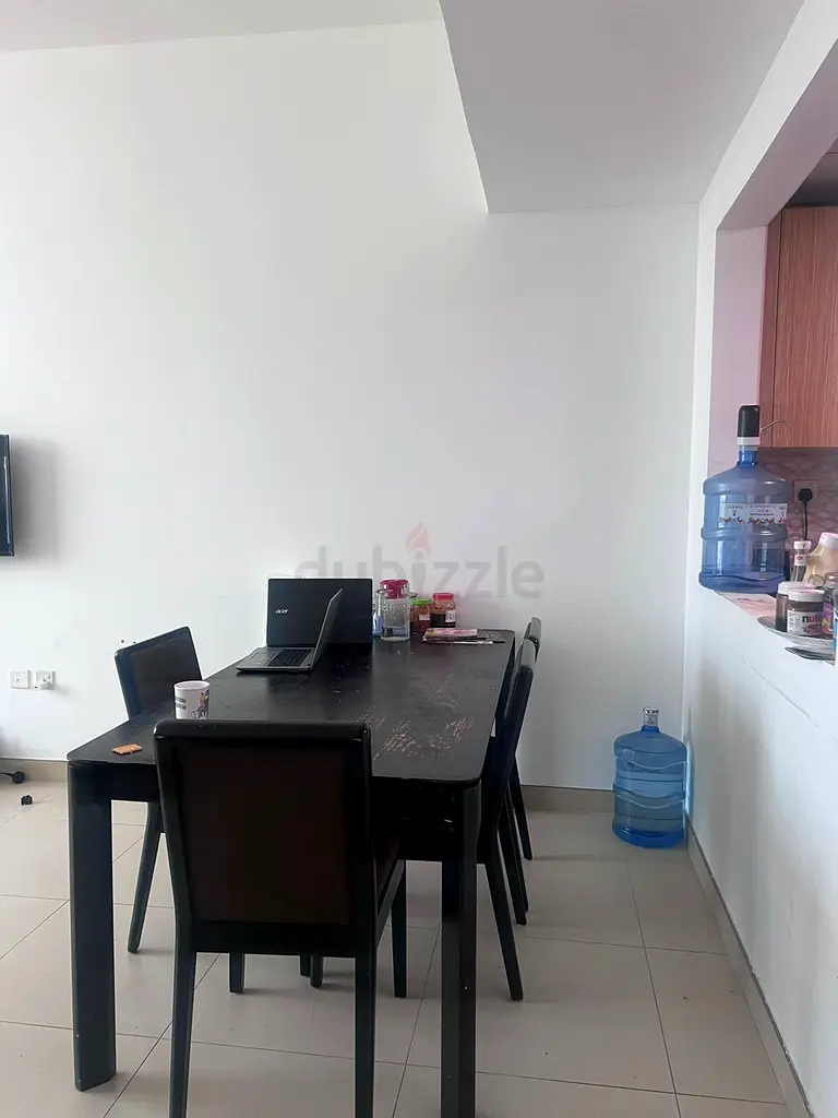 Apartment furnished room with attached bathroom and balcony. Shared