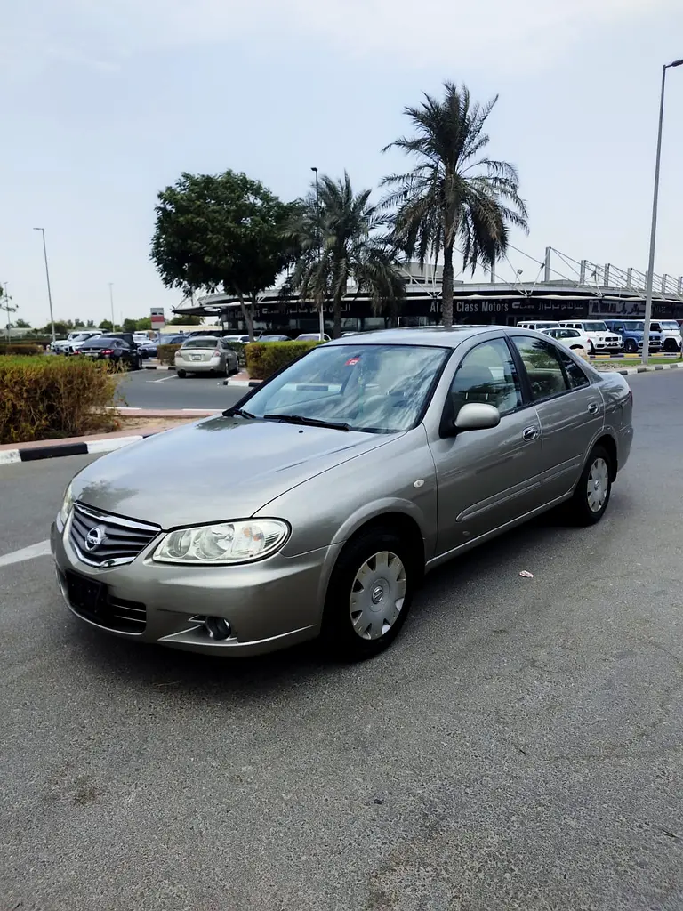 Nissan Sunny Al Calasic Model 2010 GCC mid option very nice car.