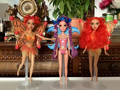 3 fairy dolls
