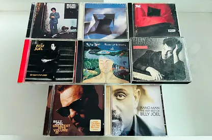 8 Billy Joel Music CD’s
