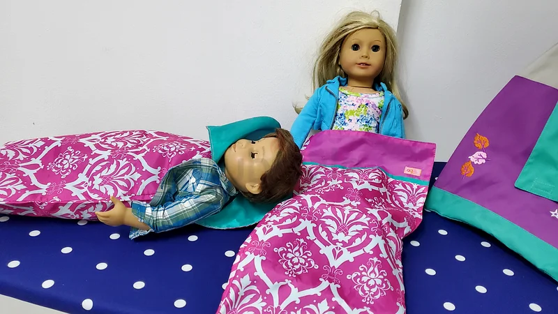 American girl doll and boy doll with tent63205355725825112