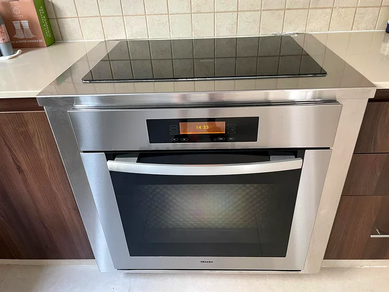 Miele latest model electric oven and 75cm induction cooktop builtin