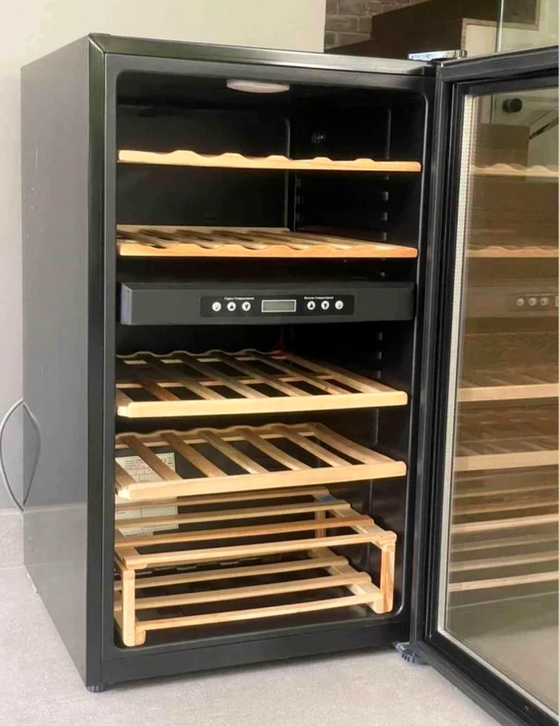 Hoover wine bar fridge 36 bottle dual temperature neat and clean دوبيزل