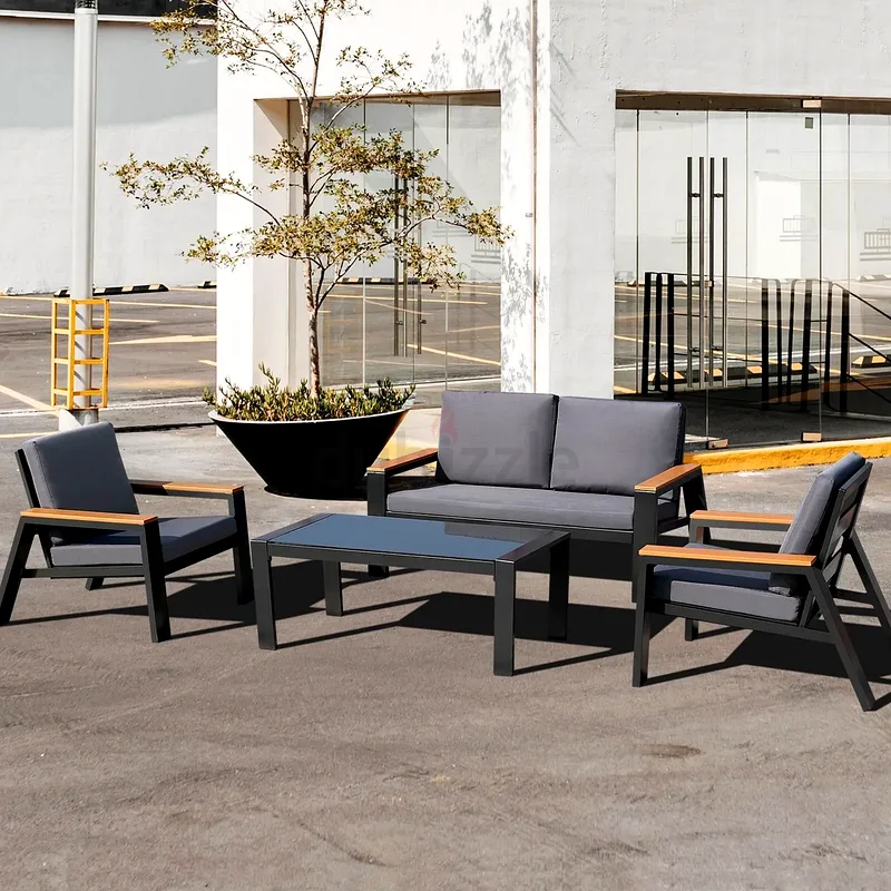 Outdoor garden 4 seats sofa with dark grey cushions and coffee table