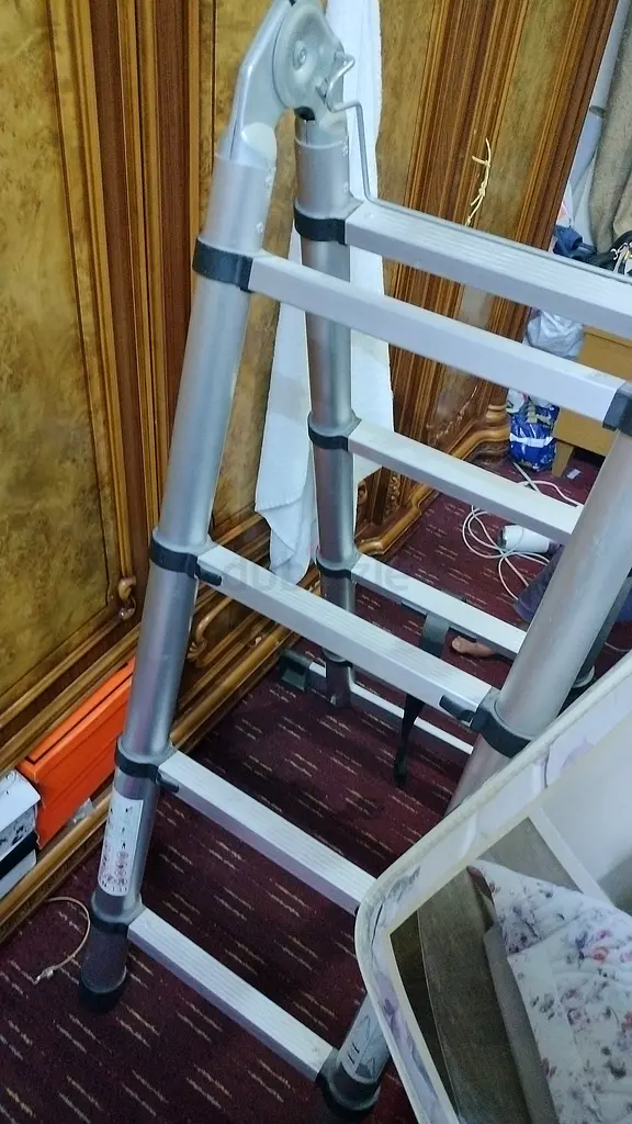 Telescope folding ladder