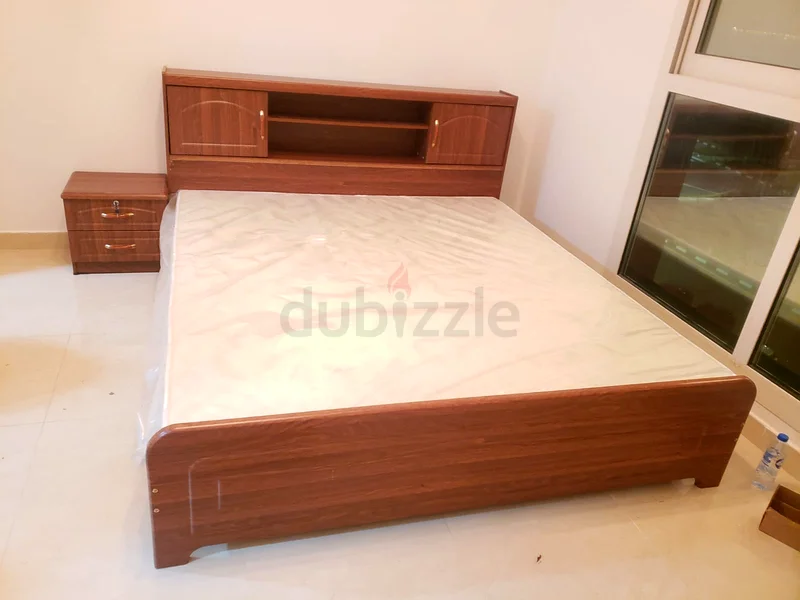 BRAND NEW KING SIZE WOOD BED WITH MATTRESS AVAILABLE