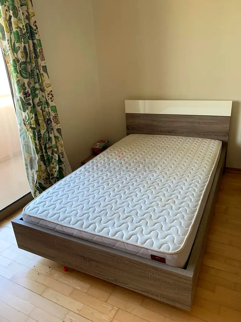 Single bed frame (Dublin) and mattress for sale.