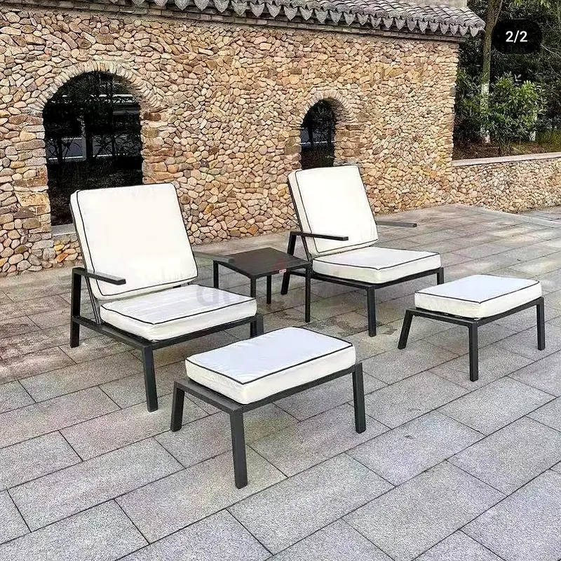 Outdoor garden chairs, table and foot rest set