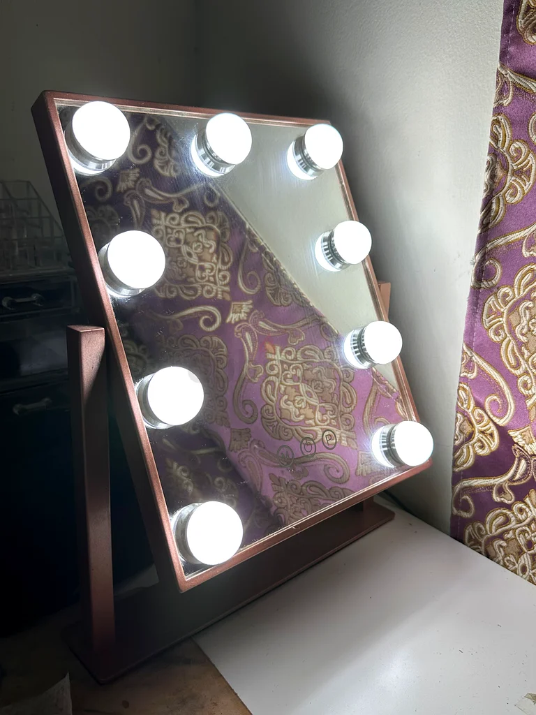 Make up vanity mirror and ikea white table.