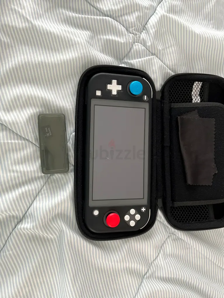 Nintendo switch lite for sale 1 game included