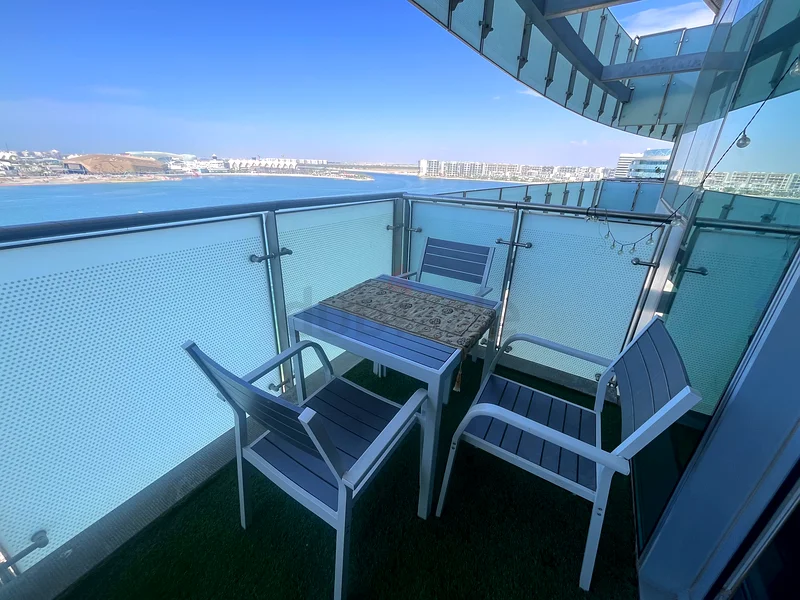 Table and chairs exterior balcony