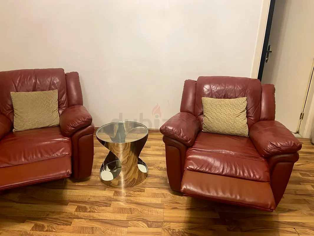 2 single reclining chairs leather from The One