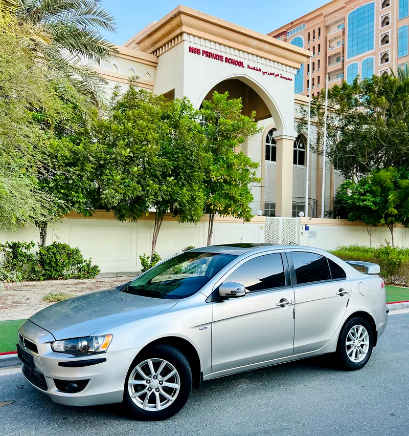 A Very Clean And Beautiful MITSUBISHI LANCER 1.6L 2015 SILVER GCC WITH