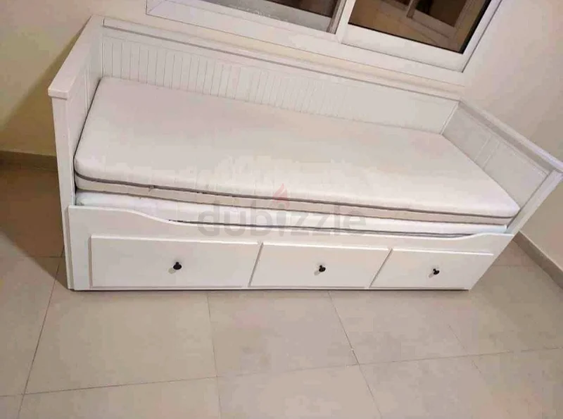 IKEA Hamnes day bed with 3 big storage drawers underneath and with 2