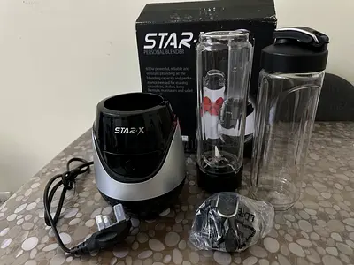 Brand New personal blender with two bottles