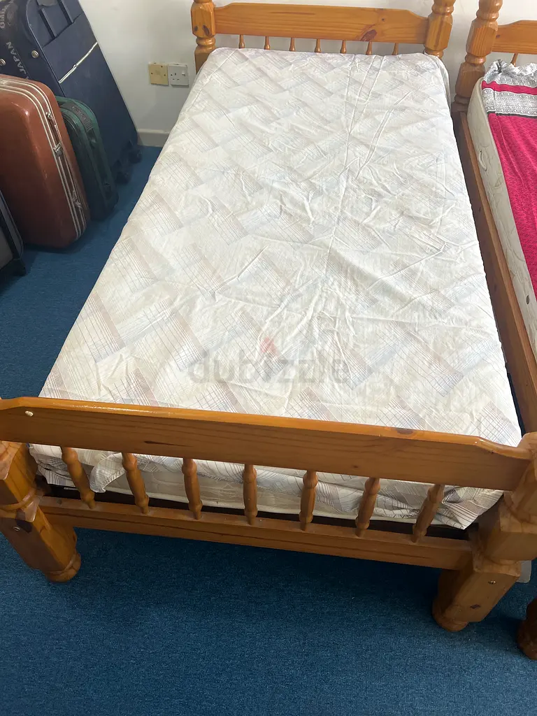Two good quality used single beds (with extra firm orthopedic mattress