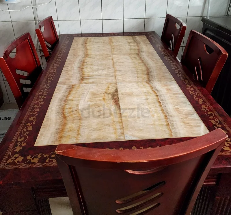 Wooden Dining Table with Thick Marble Top 5 chairs cushioned.