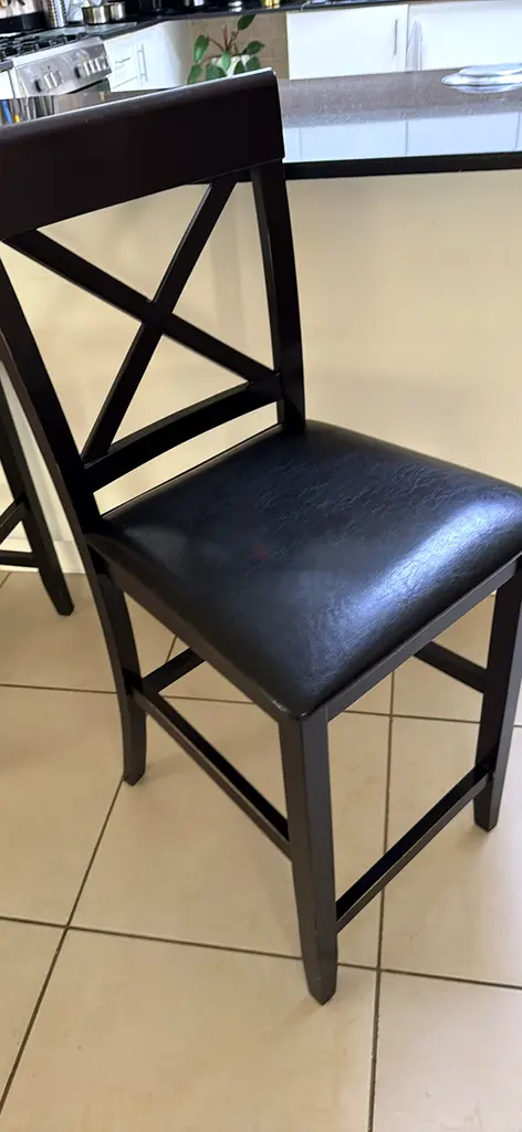 2 bar chairs with leather seats