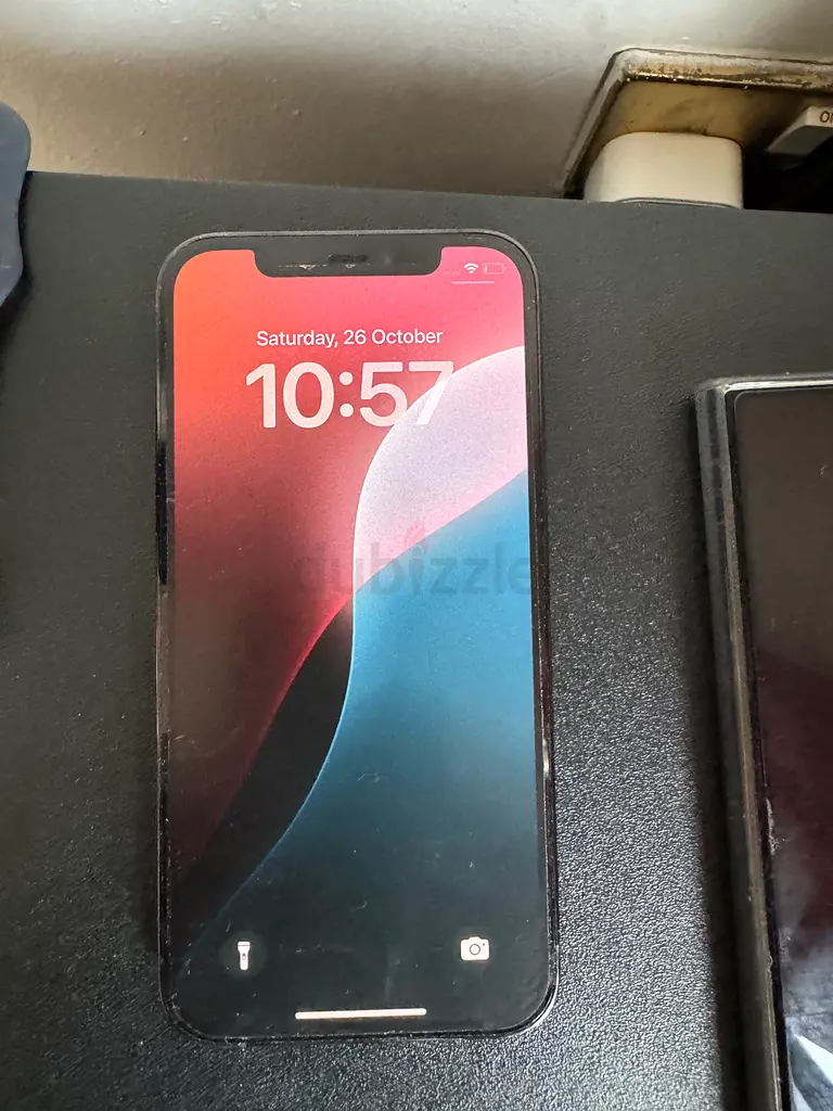 iPhone 12 Pro with cover and life long screen protection.