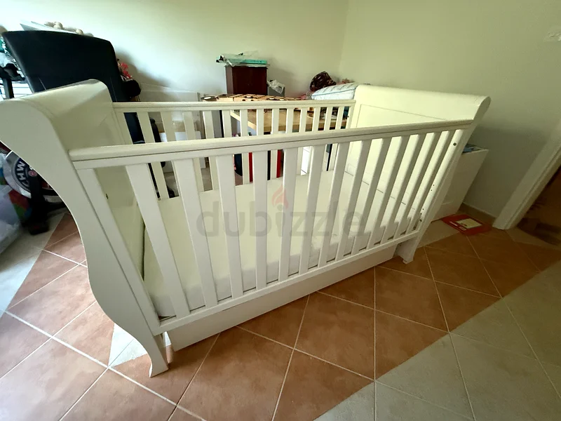 Large solid wood baby cot (John Lewis)