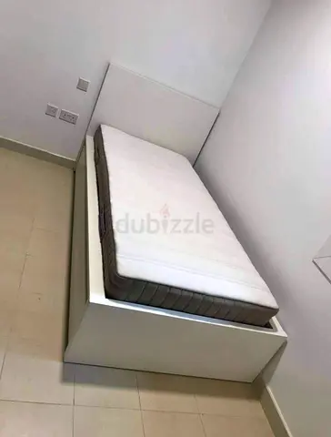 Ikea malm single bed with 2 underneath storage drawers and Ikea brand mattress