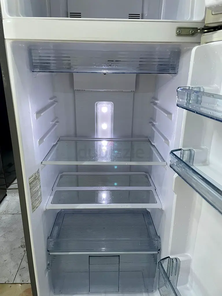 Big size fridge with free home delivery.