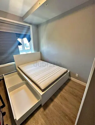 Ikea malm double bed with 2 underneath storage drawers and Ikea brand matresses