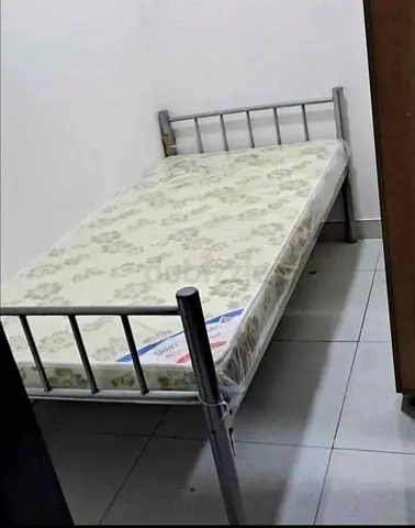 Single size metal bed with mattress for sale