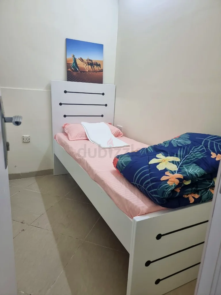 Partition for single in a clean and quiet apartment close to ADCB Metro64049671324034112
