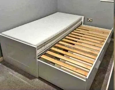 IKEA brimness Day bed with 2 storage drawers underneath and with 2 IKEA mattresses is available