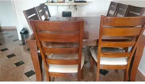 Wooden dining set for sale with eight chairs