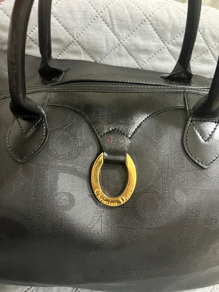 Christian dior duffle bag size 5563240639593985112