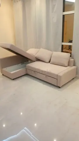 IKEA L shape sofa cum bed with big storage and you can fix the storage left or right any side