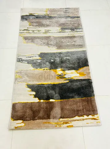 Good quality rug with abstract pattern: gold, grey and brown for sale!