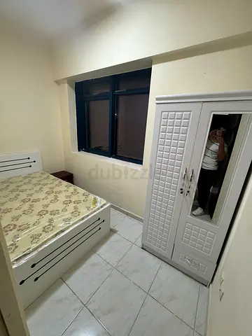 Immediately available-Fully closed partition room with window available at Al Nahda 2 Dubai