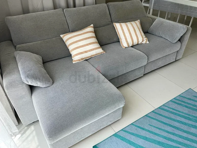 أريكة سرير على شكل حرف L من ايكيا إسكيلستونا، باللون الرمادي الفاتح63185233653122111