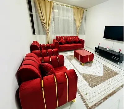 Red brand new sofa set with pillow and table