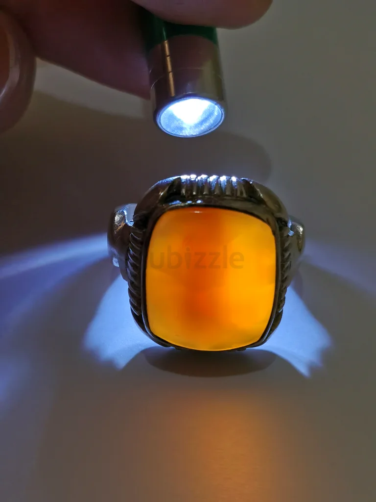 A ring with a Yemeni peach-colored agate stone63232166270083111
