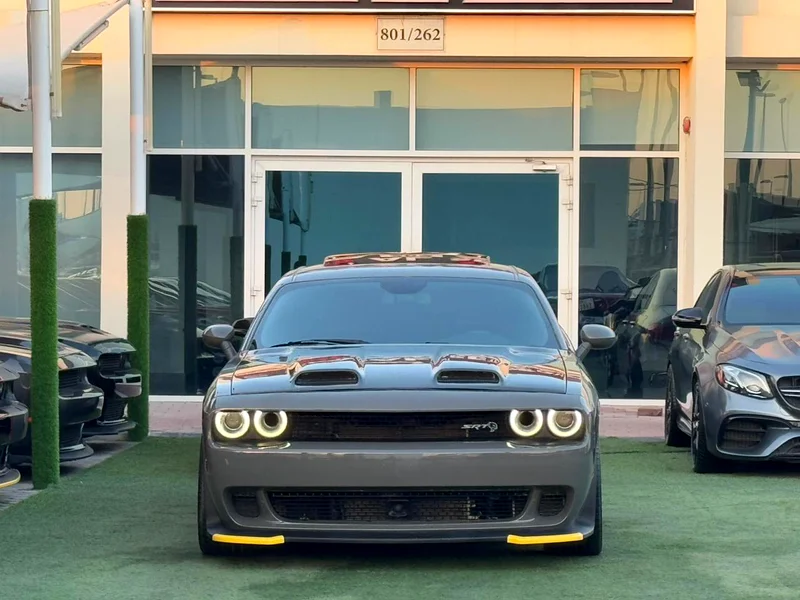 DODGE CHALLENGER HELLCAT SRT 2019  
Service history (Al Futaim)  
Clean title  
Full options  
Original paint63154618520835111