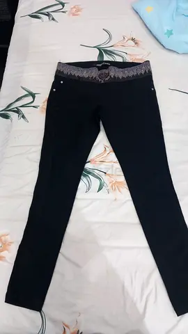 Black stretch pants with lace on the sides, with an embroidered belt, made in Turkey, size large