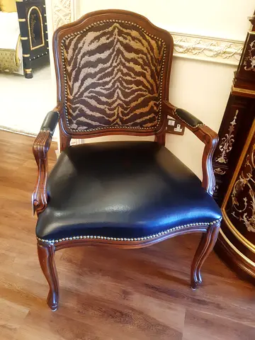 Arm chair with  leather and Italian fabric