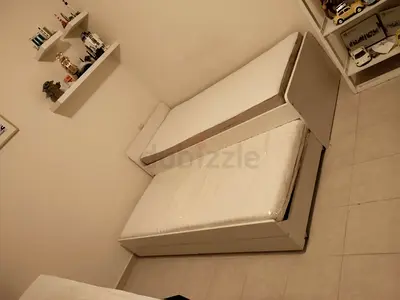 IKEA slakt bed frame with under bed 2 storage drawers underneath and with 2 IKEA mattresses