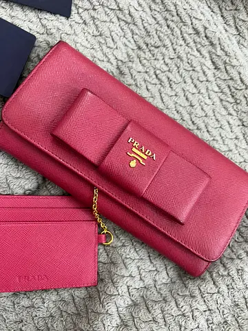 Prada bow wallet pink