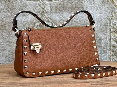 Valentino Garavani  Rockstud leather crossbody bag.