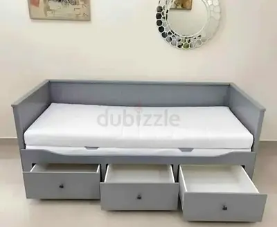IKEA Hamnes Day bed with 3 storage drawers underneath and with 2 IKEA mattresses