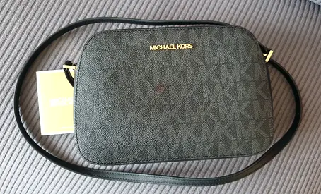 Michael Kors Crossbody Bag for Sale in very good condition