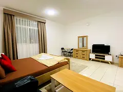 Close to Dragon mart | Spacious Studio | New and Clean