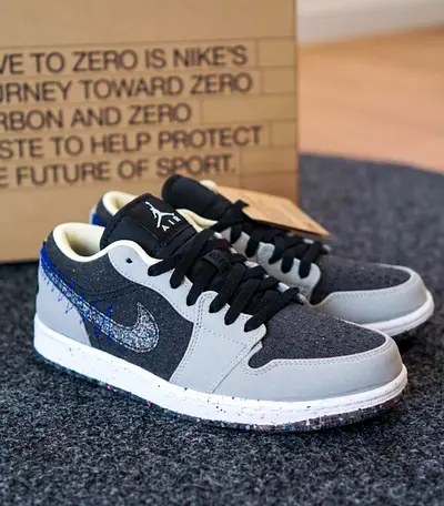 Jordan 1 low Carter black grey