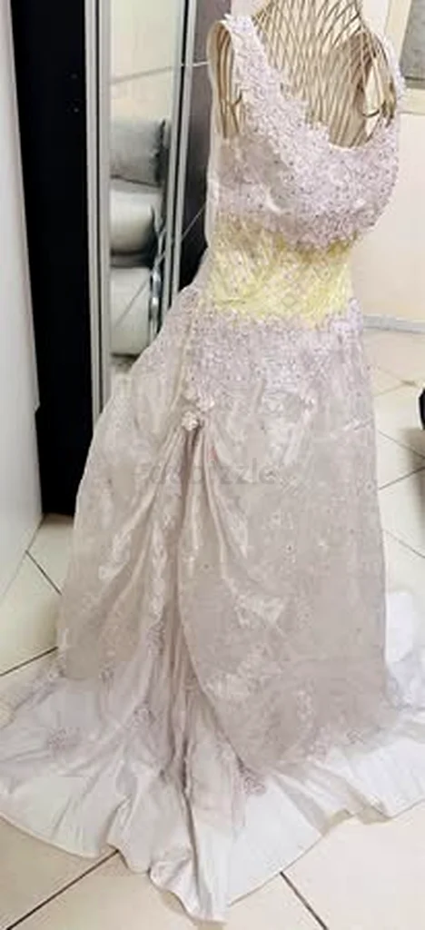 Wedding gown brand new used once size small 30 bust size cash on delivery can be done all over UAE63238583170433113